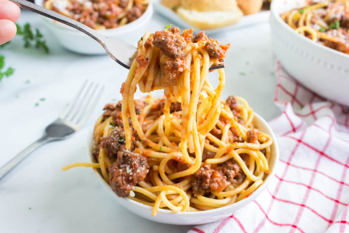 Instant Pot Bolognese Sauce in a bowl with pasta