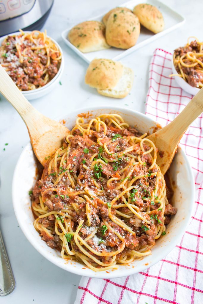 Instant Pot Bolognese Sauce in a bowl with pasta