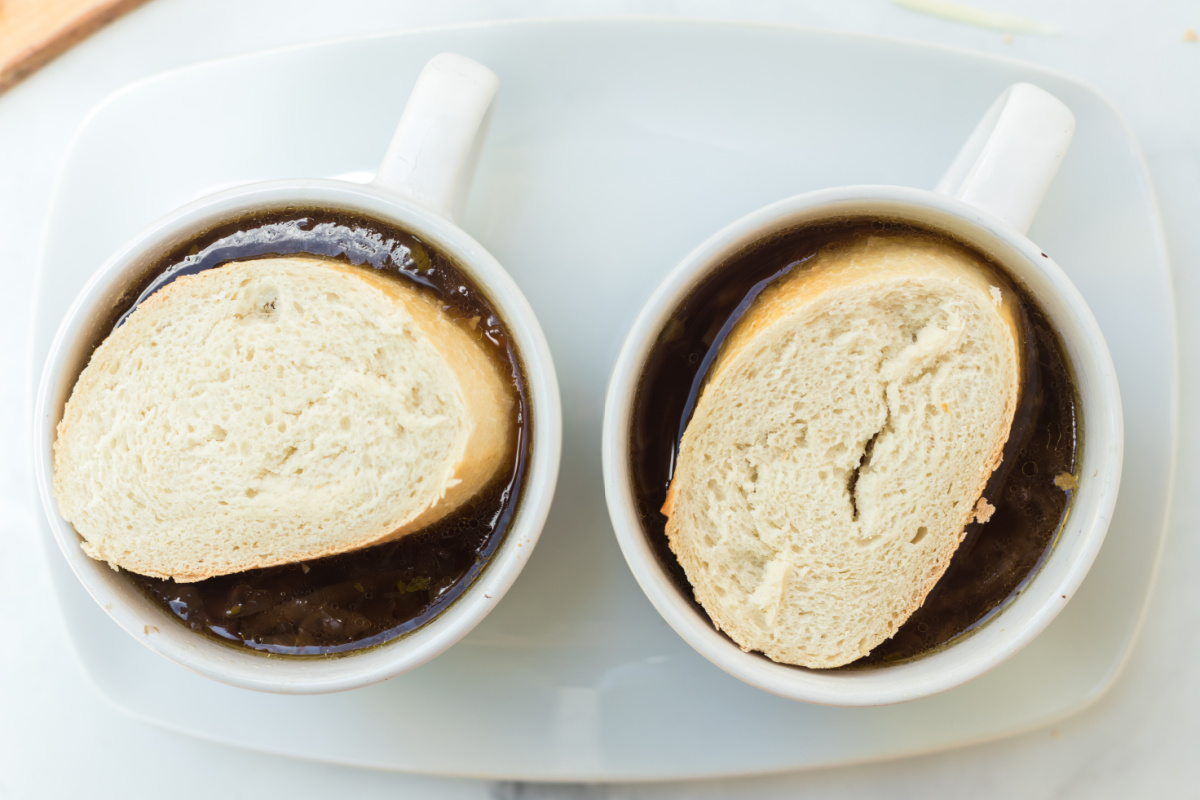 bread sliced added on top of soup