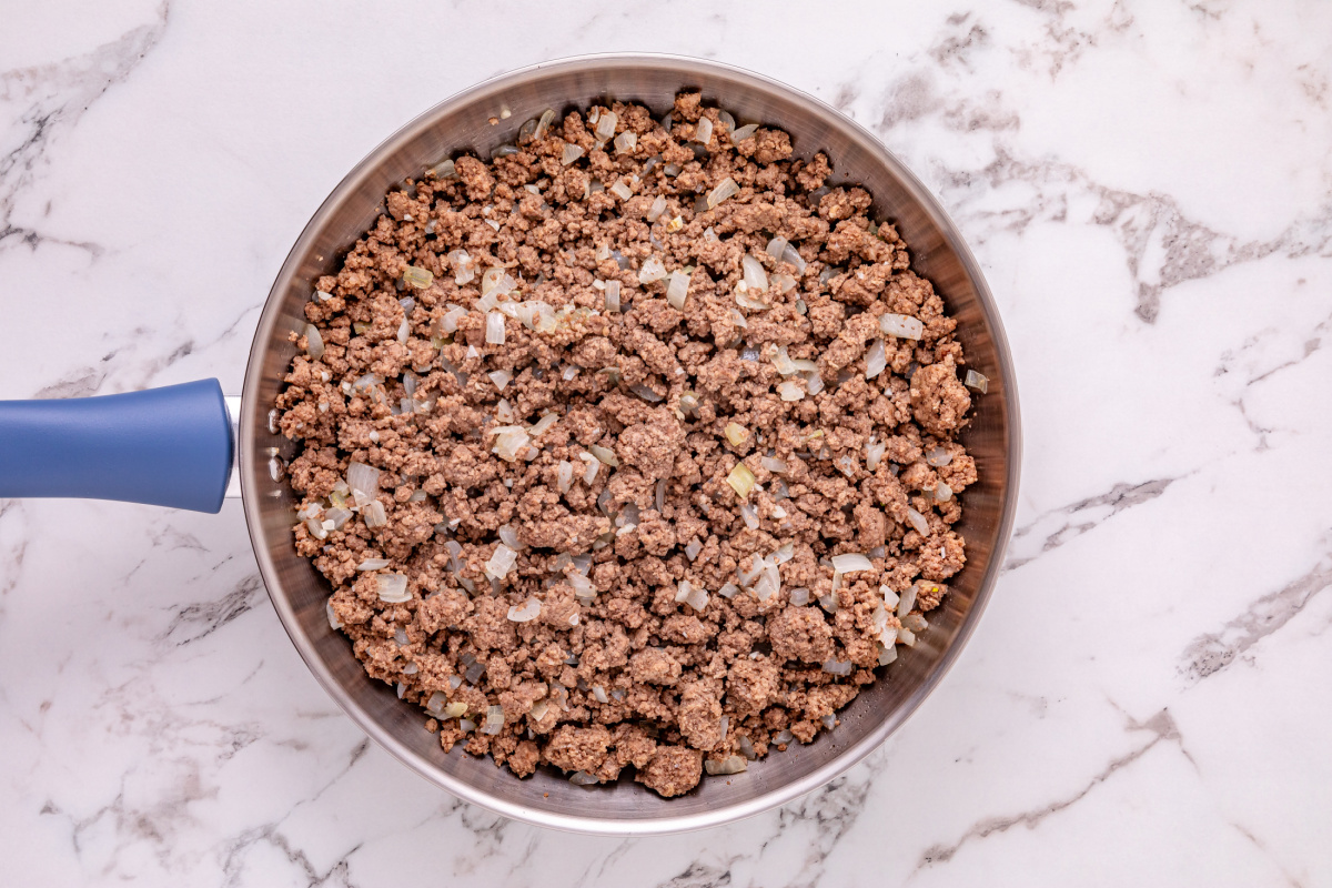 beef cooking in a pan