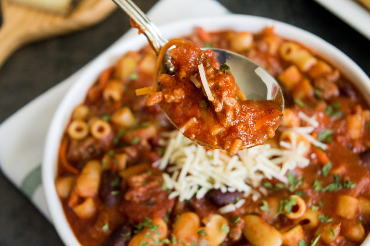 Slow Cooker Pasta e Fagioli Soup in a bowl with a spoon