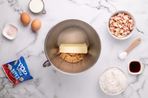 butter and sugars in a mixing bowl