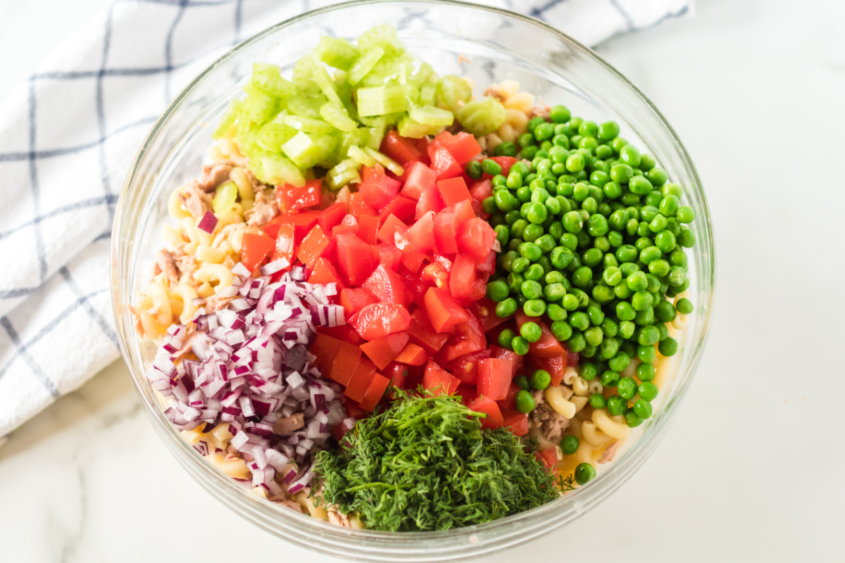ingredients for tuna pasta salad in a bowl