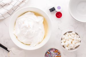 whipped topping added to pudding bowl