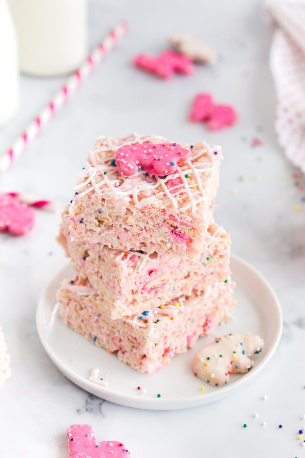 Animal Cookie Rice Krispie Treats stacked on a plate