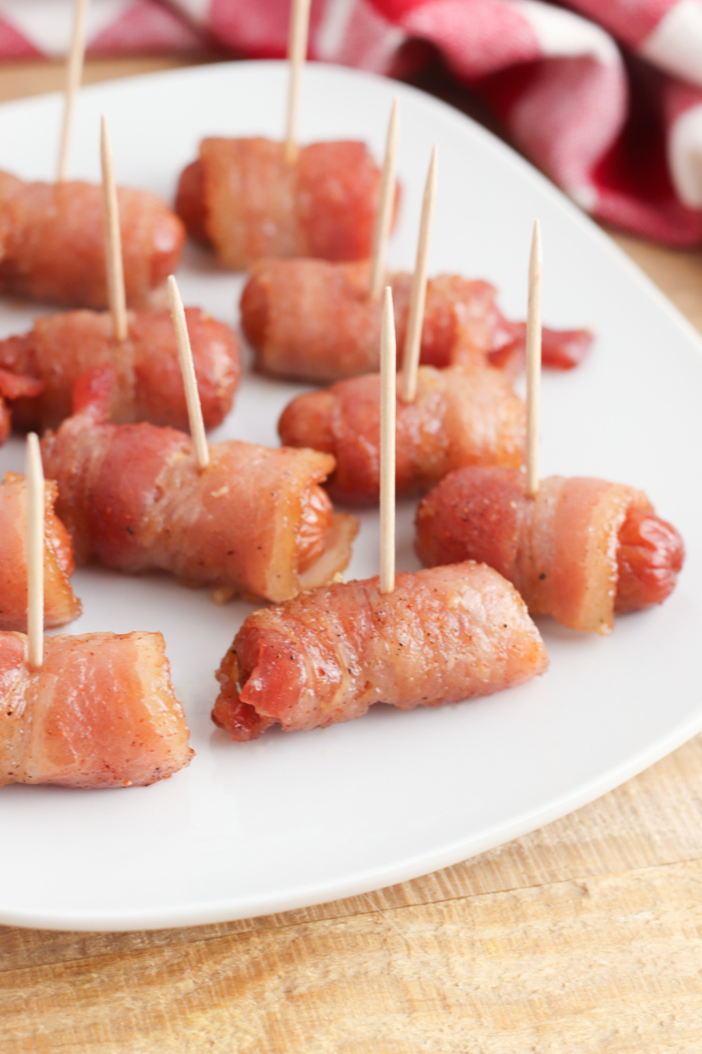 Cajun Bacon Wrapped Sausages on a plate