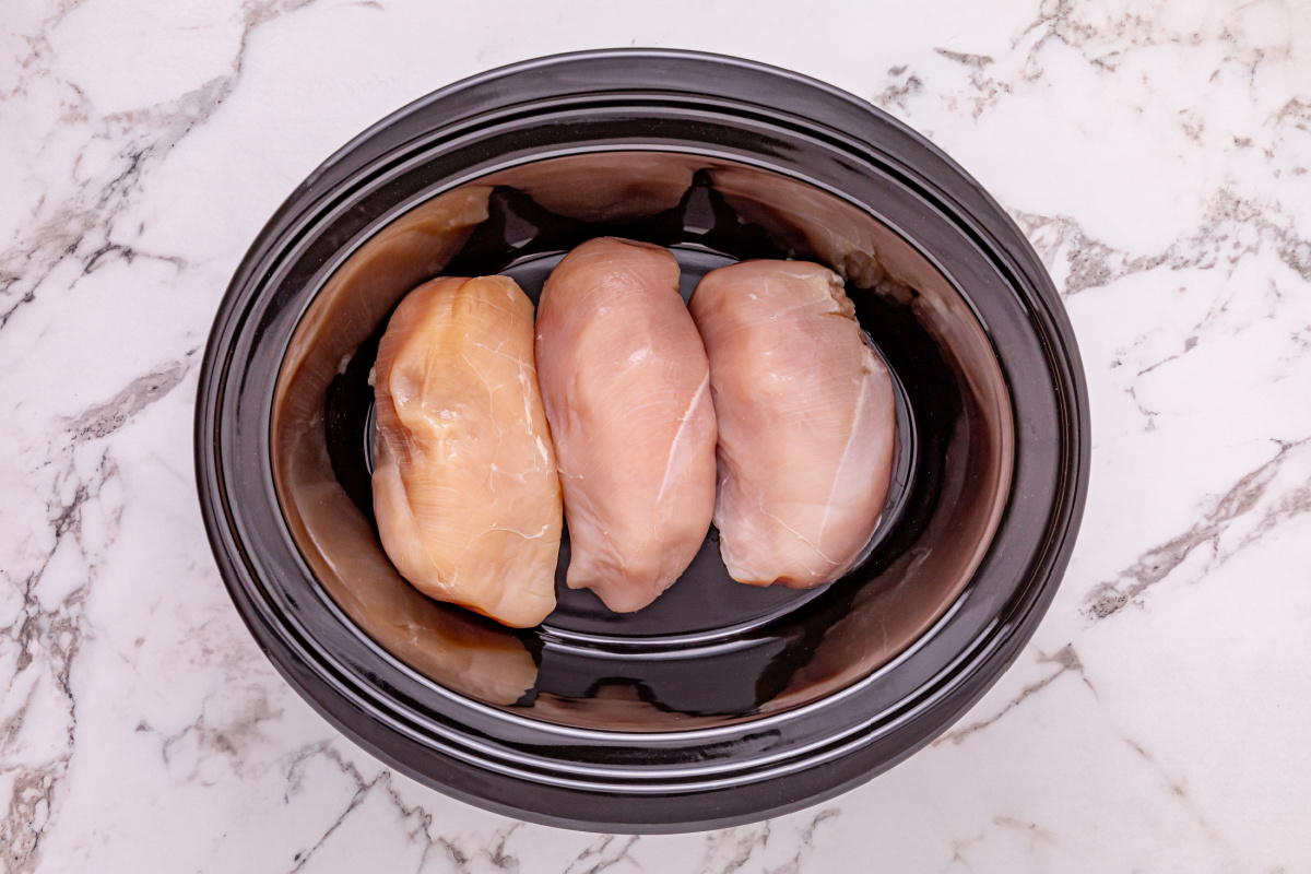chicken breast placed in slow cooker