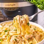 fork scooping up Slow Cooker Chicken and Noodles