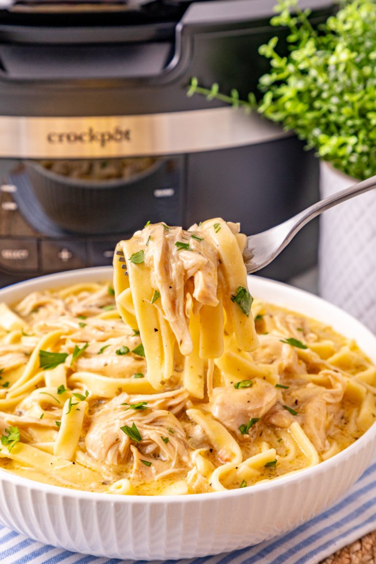 fork scooping up Slow Cooker Chicken and Noodles