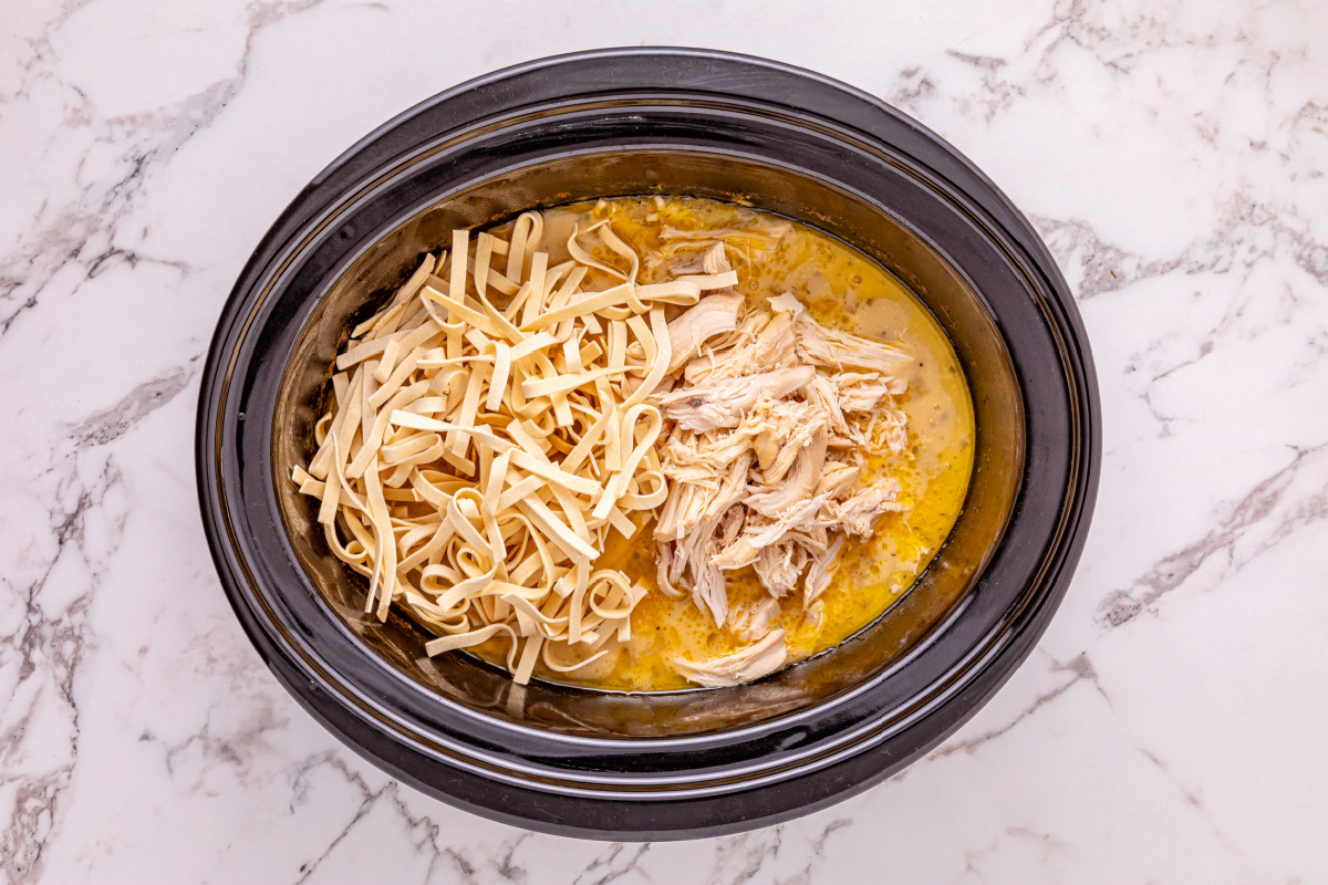 shredded chicken and noddles added back to slow cooker