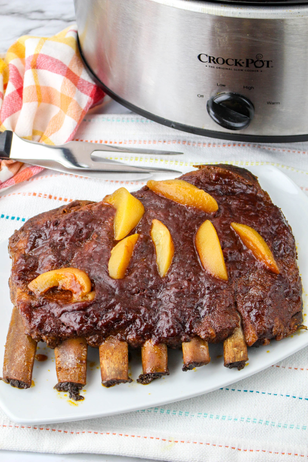 Slow Cooker Peach BBQ Ribs on a plate