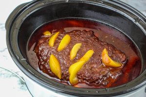 cooked ribs in a crockpot