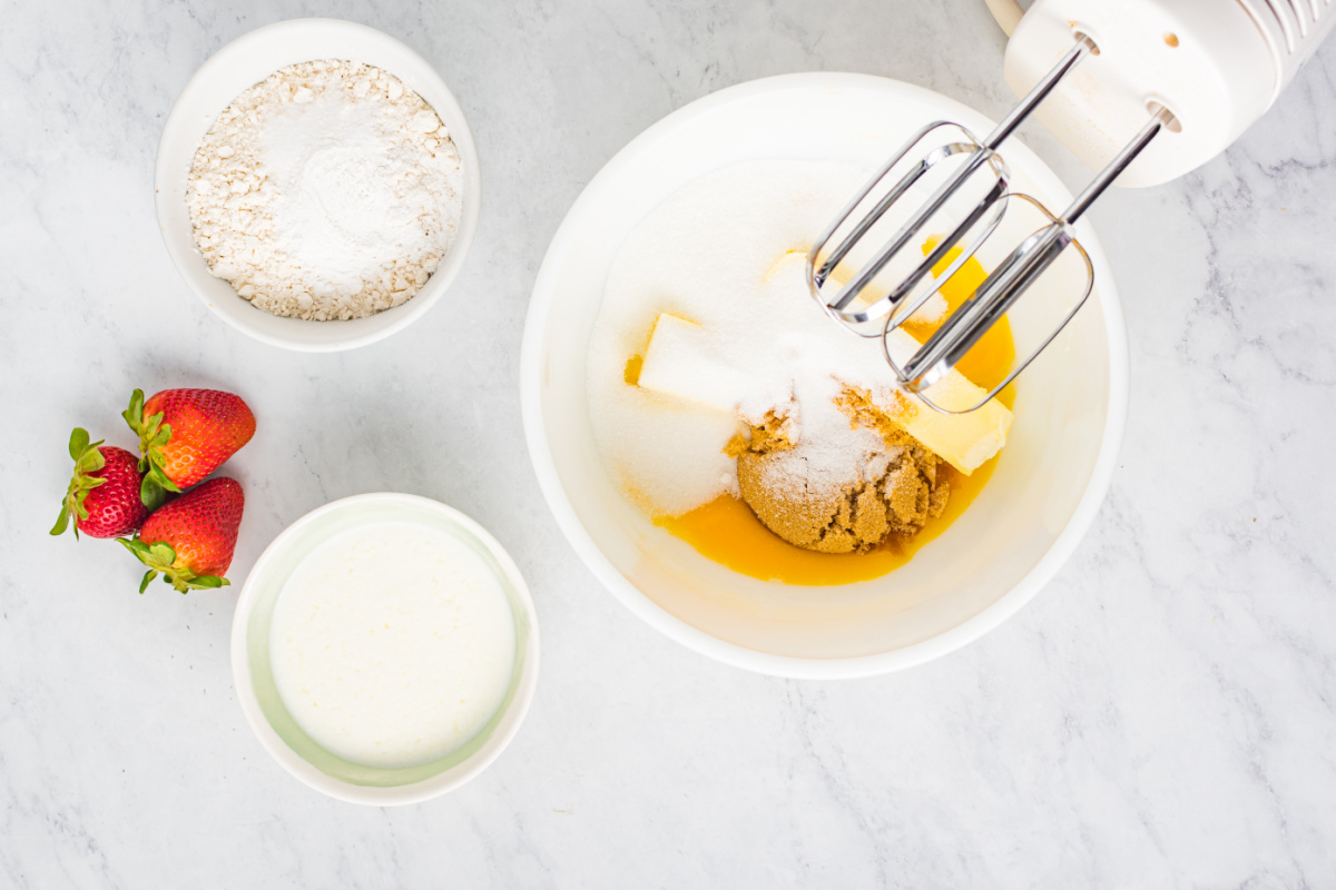 butter, sugar, brown sugar, and egg yolks in a mixing bowl