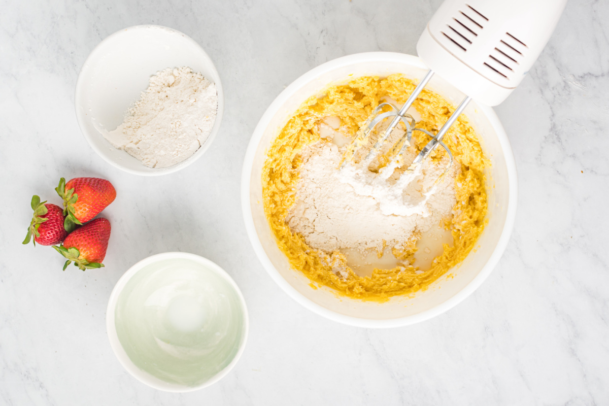 flour, soda, baking powder and salt added to bowl