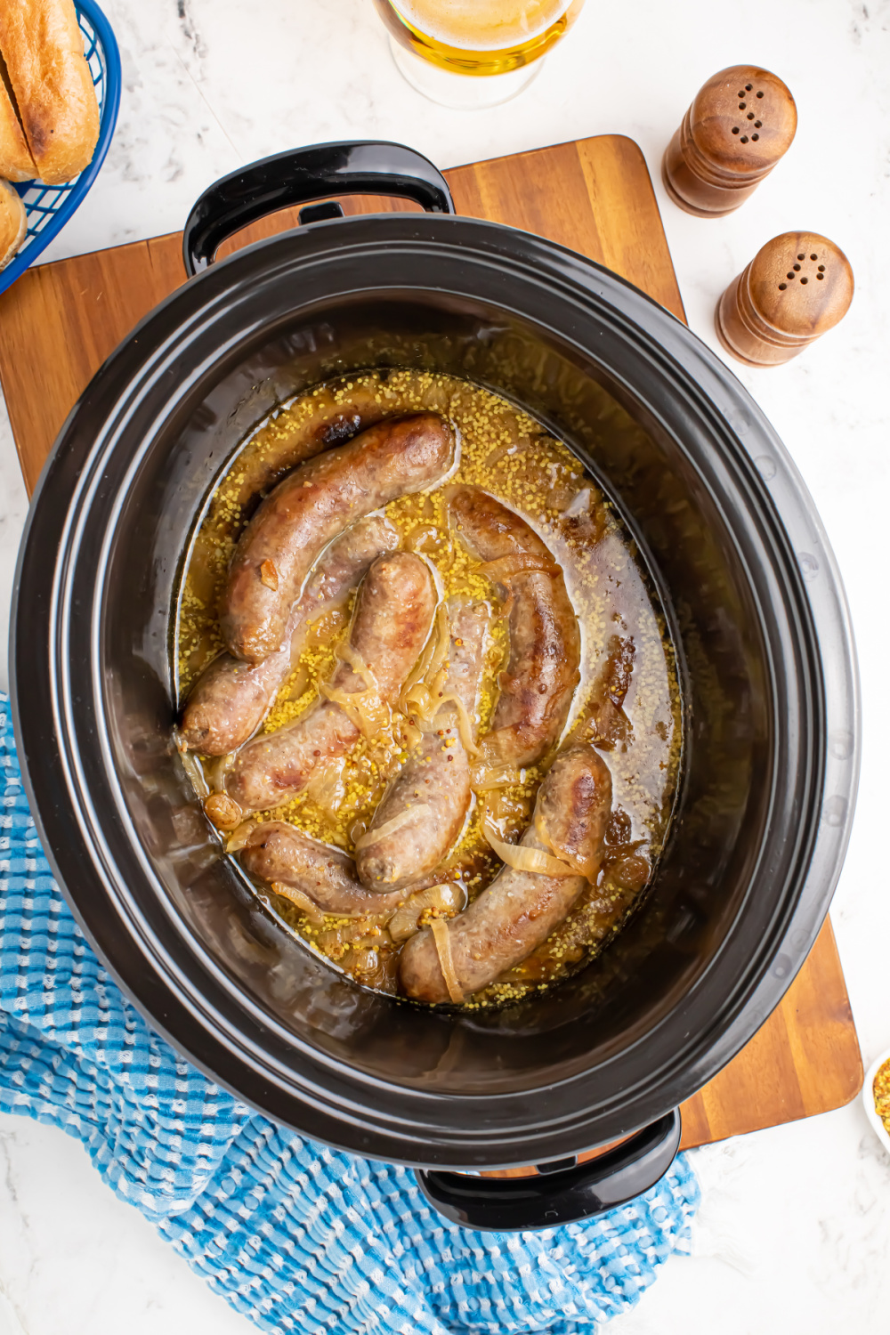 cooked brats in a slow cooker