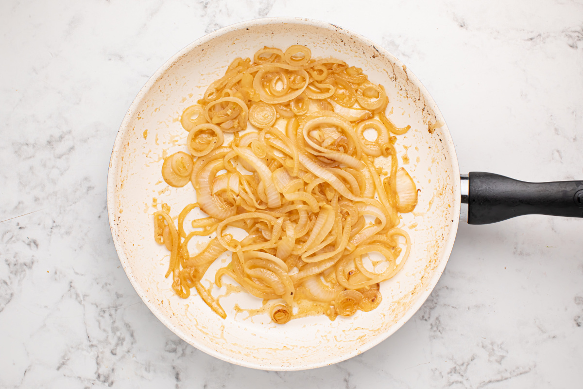 cooking onions in a pan