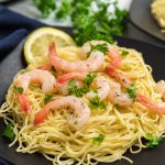 Baked Shrimp Scampi on a plate with pasta