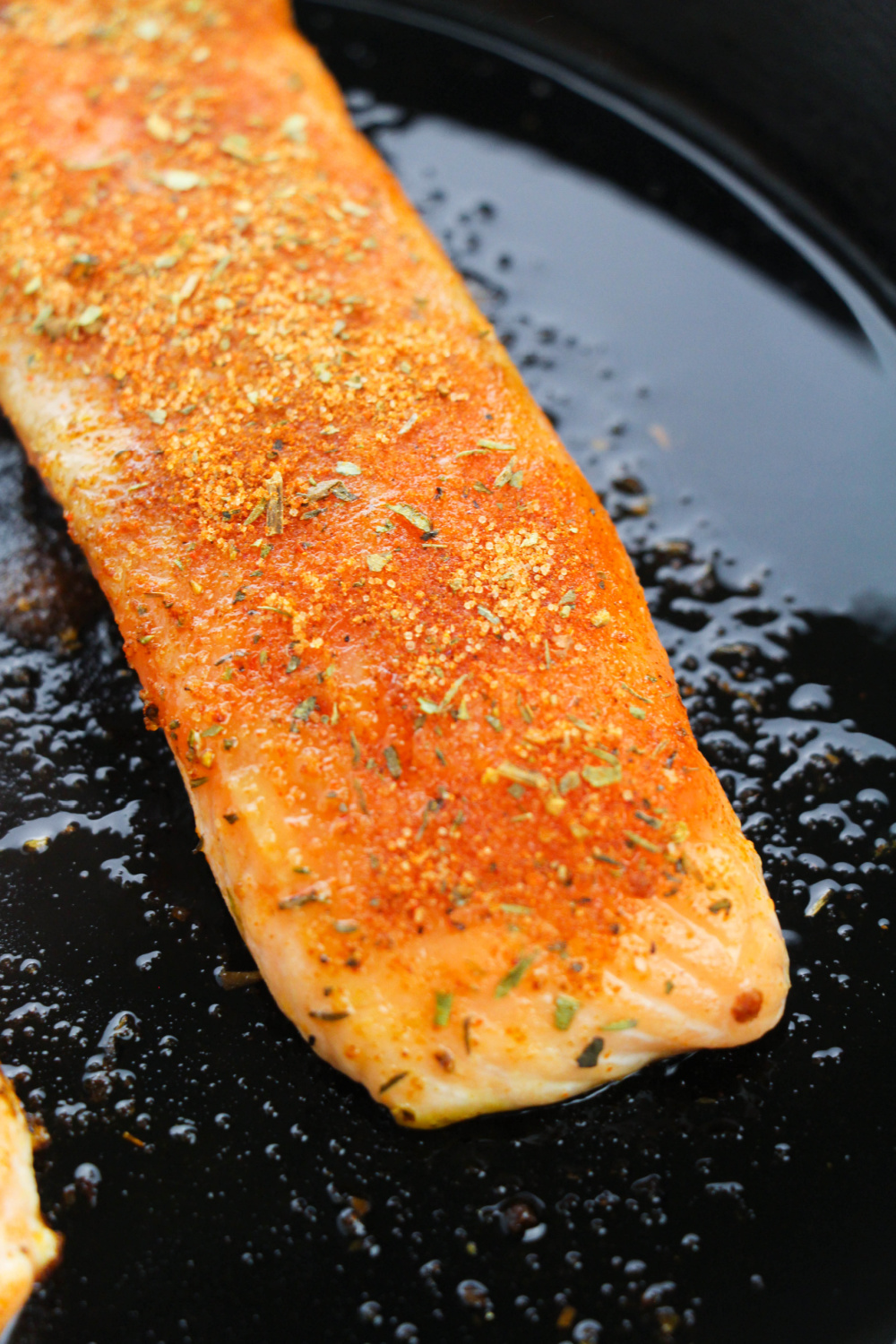 salmon added to pan
