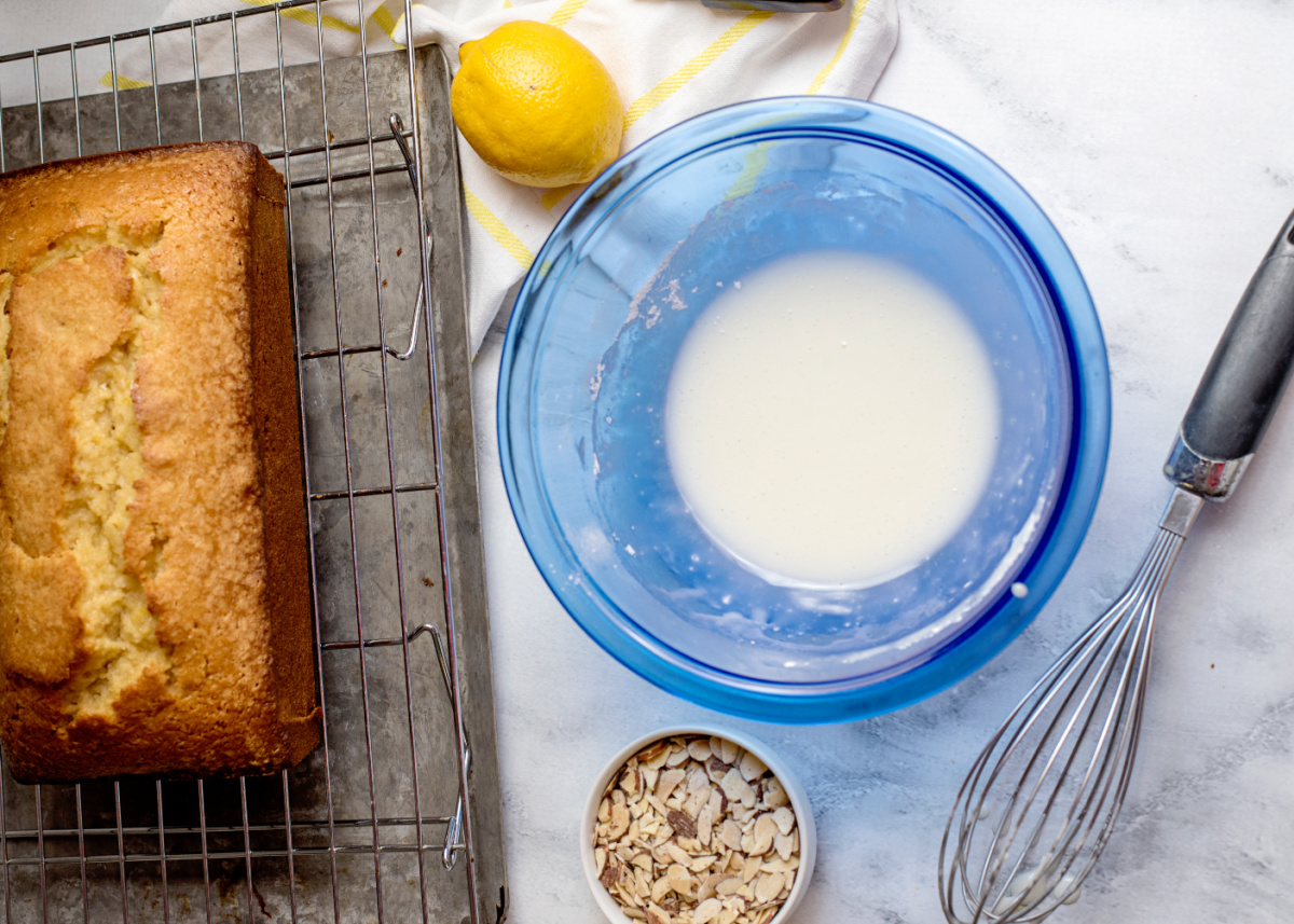 powdered sugar, lemon juice, and almond extract in a bowl