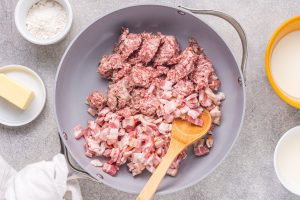 bacon and sausage in a pan