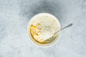 sour cream, mayo and ranch seasoning in a bowl