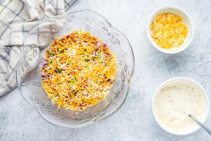 shredded cheese added to top