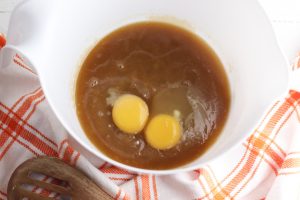 butter, sugar, eggs and vanilla added to bowl