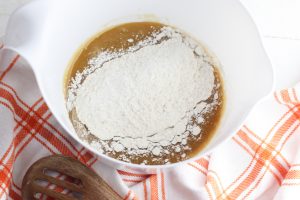 flour mixture added to bowl