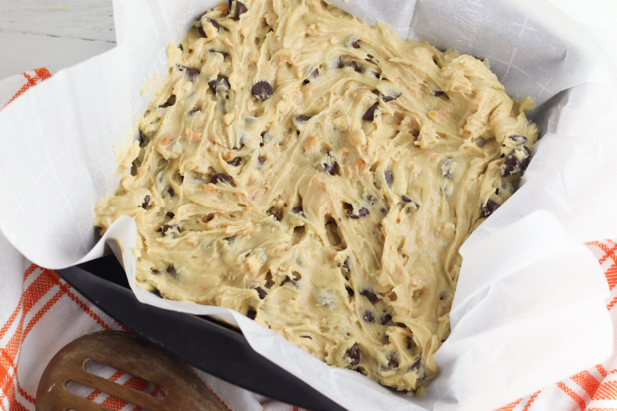 cookie bar batter placed in pan