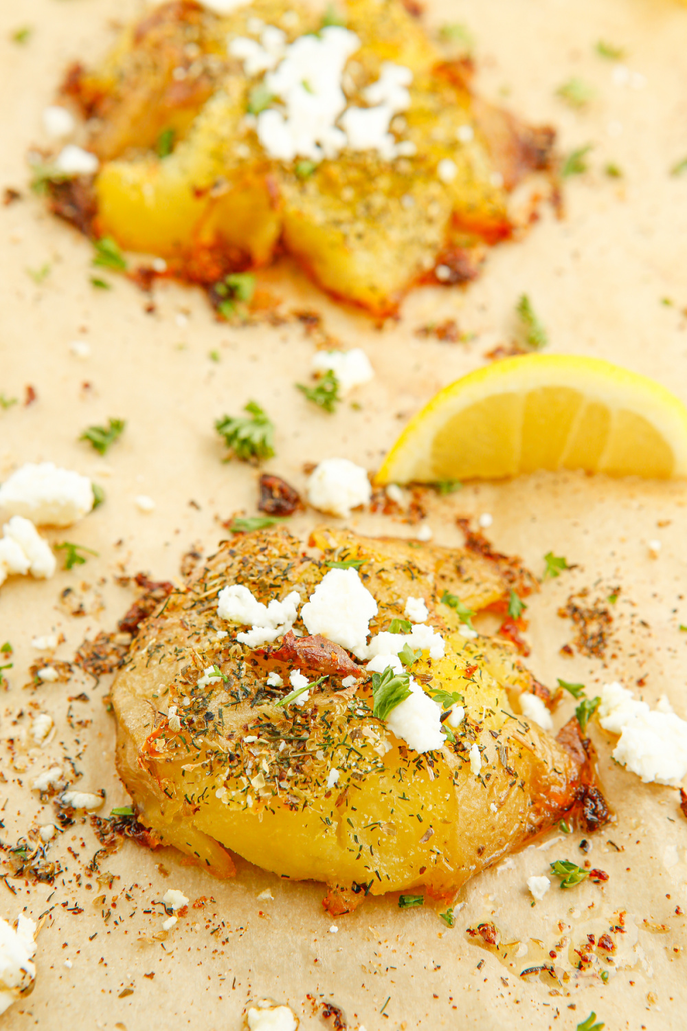 Crispy Greek Smashed Potatoes on a baking sheet