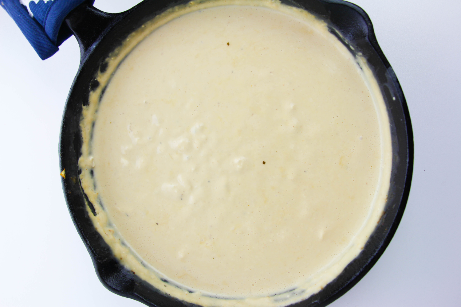 white sauce in a pan