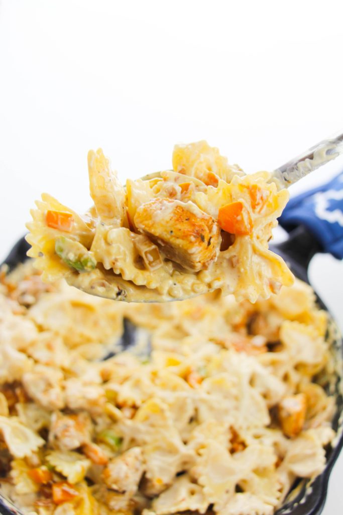 Easy Cajun Pasta Skillet being picked up with a fork