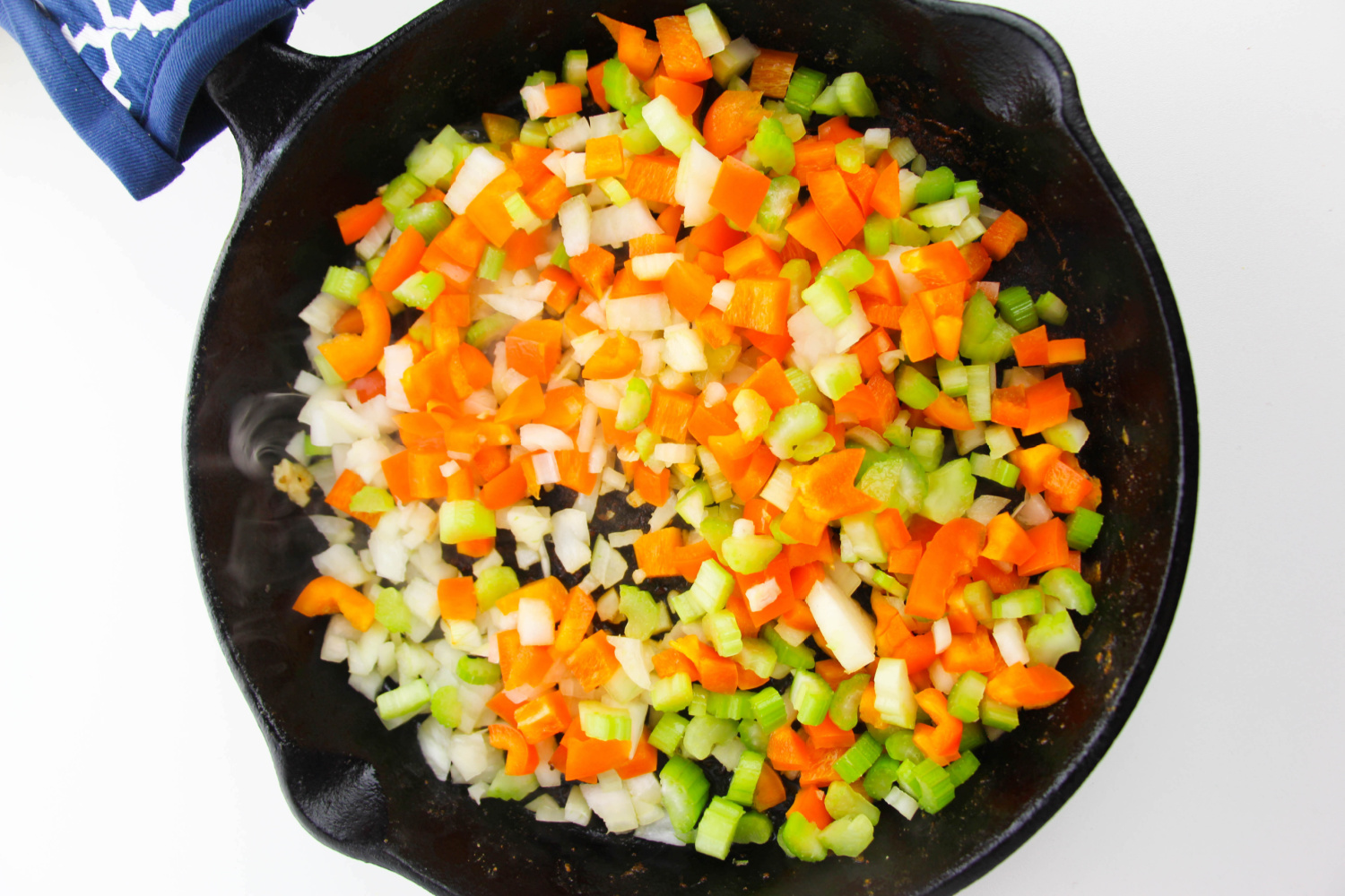 chopped veggies added to pan