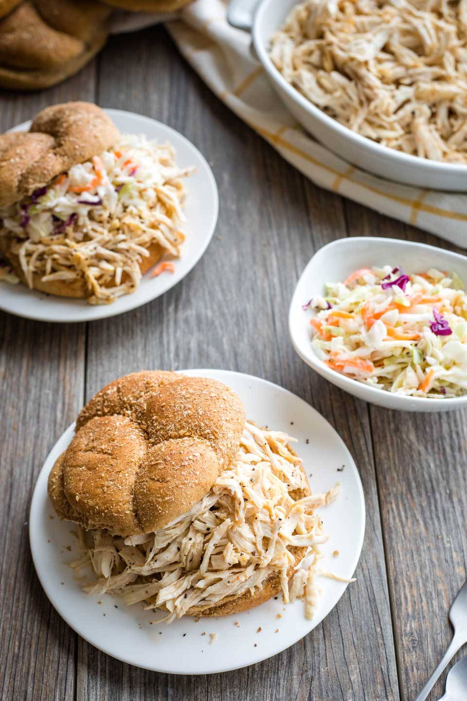 shredded chicken sandwiches on plates