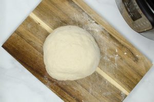 dough ball on a cutting board