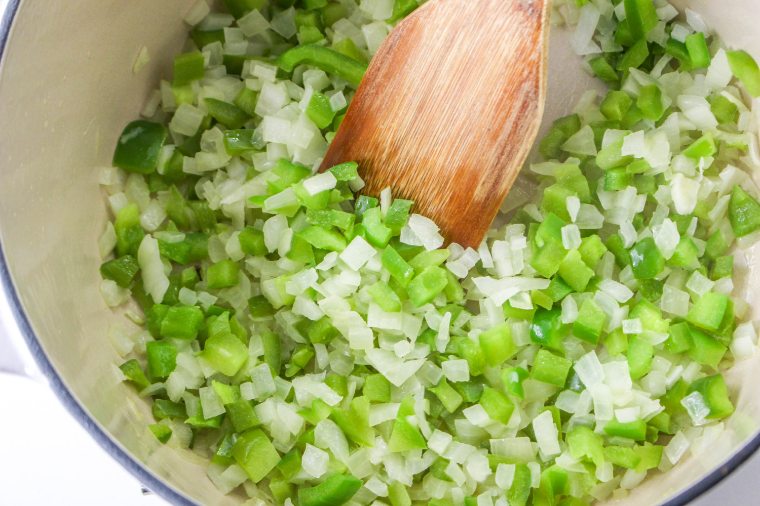 veggies sauting in a pan