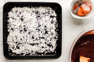 shredded coconut on a baking dish