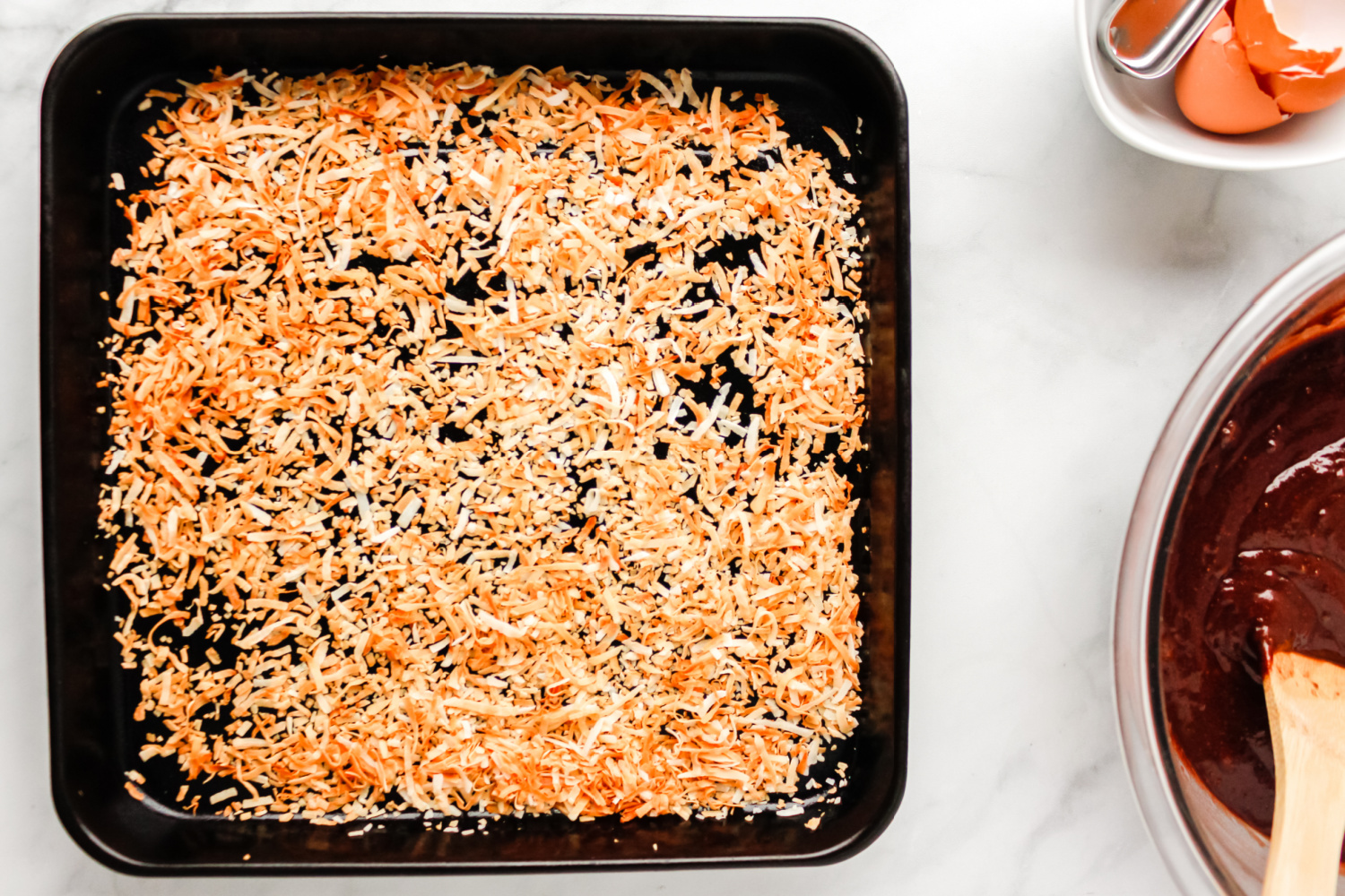 toasted coconut on a baking dish