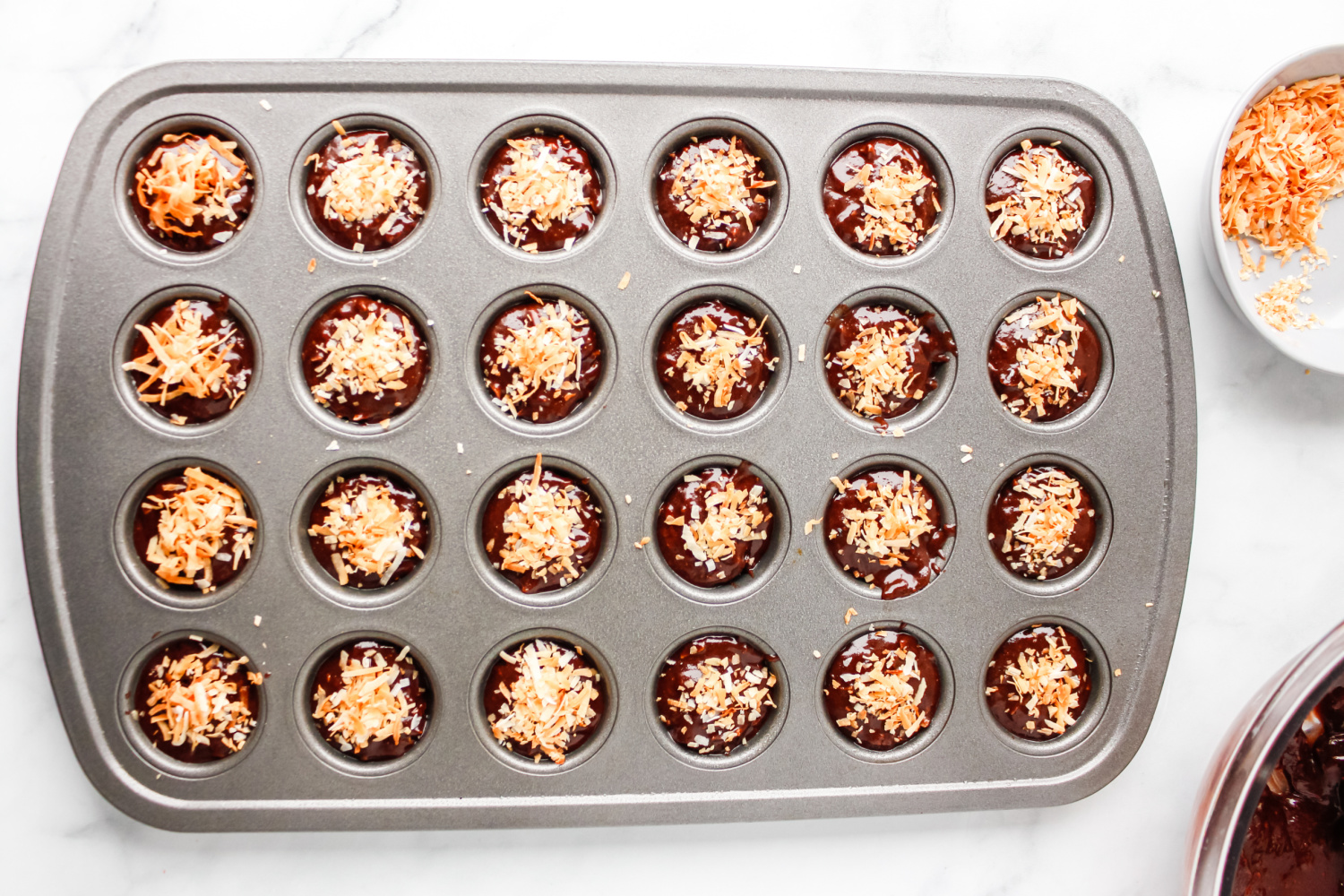 toasted coconut sprinkled on top of brownies